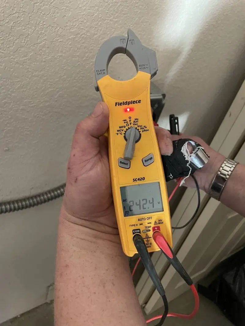 Voltage testing with clamp meter during Generator Installation in Cibolo